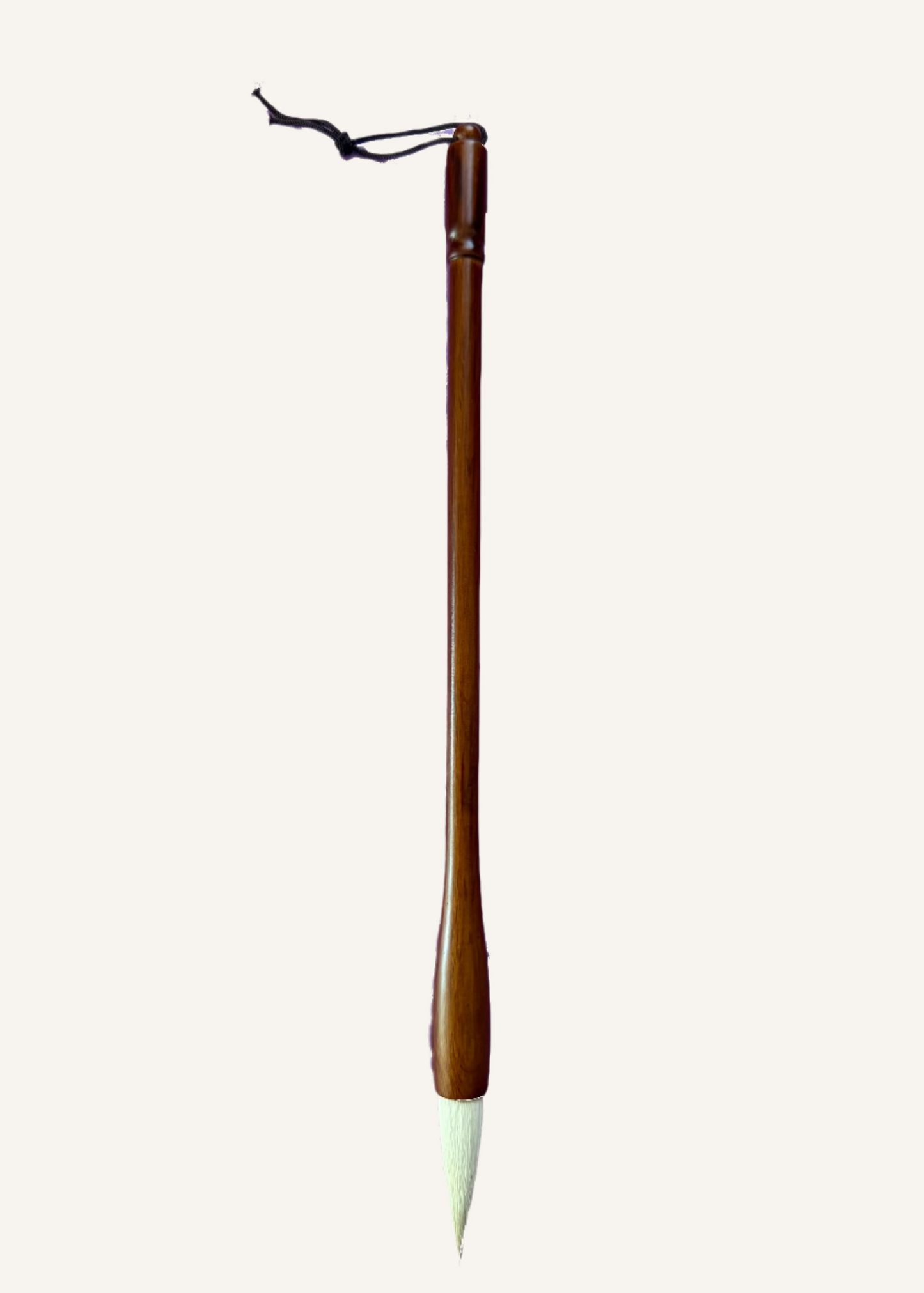Traditional Chinese calligraphy brush with brown handle
